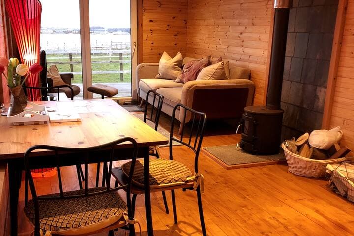 Living and dining area in warm evening light